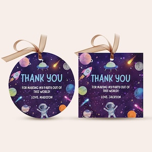 May include: Two round and square thank you tags with a space theme. The tags feature an astronaut, planets, stars, a rocket ship, and a spaceship. The text on the tags reads "Thank You for making my party out of this world!" with the names Madison and Jackson.