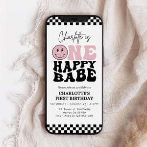 May include: A digital invitation for a first birthday party. The invitation features a pink and black retro design with the text "Charlotte is One Happy Babe". The invitation includes the date, time, and location of the party.