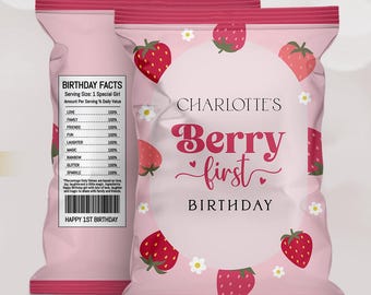 May include: Pink and red birthday party favor bag with a strawberry pattern. The bag says "Charlotte's Berry First Birthday".