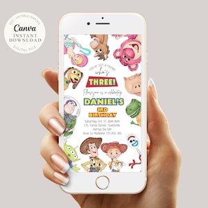 May include: A smartphone displays a digital birthday invitation featuring cartoon characters. The invitation reads "THREE!" and includes details for Daniel's 3rd birthday party. The phone is held in a hand against a neutral background.