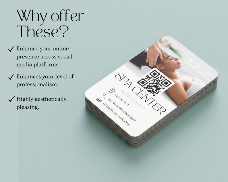 May include: A white business card with the text "SPA CENTER" in black, a QR code, and a phone number. The card also includes the text "MUSCLE THERAPY" and a location address. The background image shows a person receiving a massage.