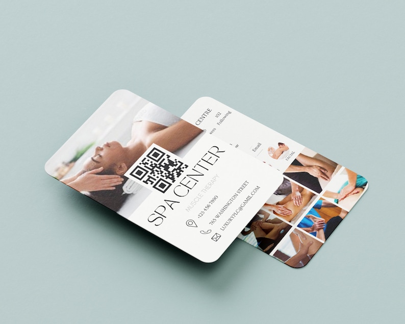May include: A white business card with the text "SPA CENTER" in black lettering. The card also includes a phone number, address, email address, and a QR code. The back of the card features a collage of photos showing different types of massage therapy.