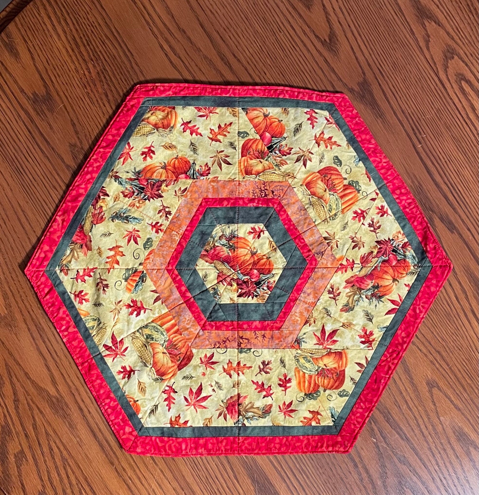 Cozy Pumpkin Quilted Table Topper NCU0DDK596