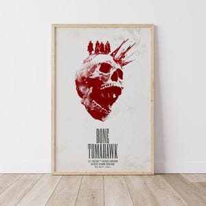 May include: A red skull with a crown of thorns on top, with the text "Bone Tomahawk" below. The poster is for the film "Bone Tomahawk" directed by S. Craig Zahler.