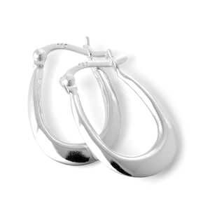 May include: A pair of polished silver hoop earrings with a teardrop shape. The earrings are smooth and reflective, with a simple, elegant design. The metal is stamped with "925".