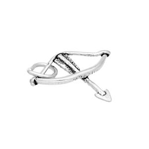 May include: A silver-toned metal charm shaped like a bow and arrow. The bow features a curved frame with a textured arrow resting across the center. A small circular jump ring is attached to the left side of the bow for hanging or attachment.
