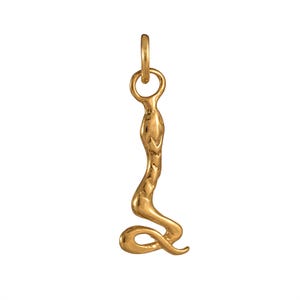 May include: A gold-toned metal pendant shaped like a slender, upright snake with a coiled tail at the base. The snake features a smooth, polished surface and is attached to a circular jump ring at the top, designed for hanging on a chain or cord.