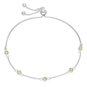 May include: A silver-toned bolo bracelet featuring a delicate chain with six round, light green gemstones. The bracelet has a sliding bead closure for adjustable sizing. The gemstones are evenly spaced along the chain.