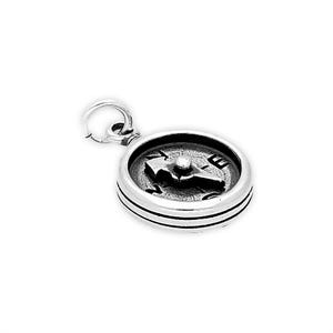 May include: A silver-toned metal charm shaped like a circular compass. The charm features a raised central needle and cardinal direction markings including the letter E. It includes a small circular jump ring attached to the top for hanging.
