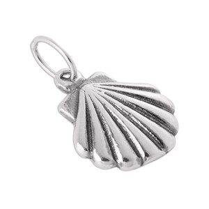 May include: A silver-toned metal charm shaped like a scallop shell with a textured, ribbed surface and a smooth, rounded bottom edge. The charm features a small, circular jump ring attached to the top, allowing it to be suspended from a chain.