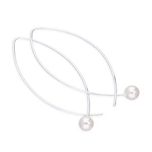 May include: A pair of silver-toned earrings featuring a curved, elongated wire design that forms an open marquise shape. Each earring is accented with a single, smooth, round white pearl attached to the end of the curved metal wire.