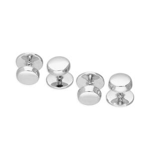 May include: A set of four silver-toned metal cufflinks, each featuring a smooth, polished, circular face and a matching circular base connected by a short, sturdy post. The metallic surface reflects light, highlighting the rounded, reflective design.