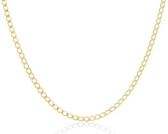 May include: A gold-colored chain necklace with a curb link design. The necklace is displayed against a white background, with a subtle reflection visible below. The chain is made of small, rounded links.