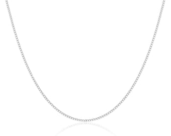 May include: A fine silver chain necklace. The chain is made up of tiny, interconnected links, giving a smooth, reflective surface. The necklace is shown against a white backdrop, emphasising its simple elegance. A classic piece of jewellery.