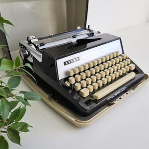 60% OFF* Typewriter Adler Gabriele 30, portable vintage typewriter from the 1960s, excellent condition. Perfect gift.