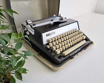 ABCポータブル - 実用タイプライター、1960年、ケース付き - Etsy 日本
