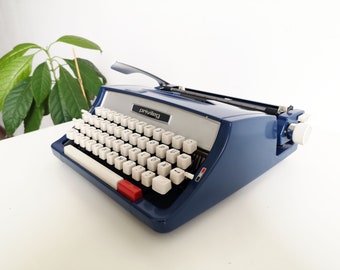60% OFF! Typewriter Privileg, from the 1960's. Vintage typewriter in awesome condition.