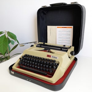 Vintage Erika E105 Portable Typewriter, 1980s with Documents