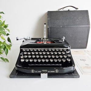 50% OFF!* Black Erika Model 8 a portable working vintage typewriter from the 1950s. Unusual gift, retro office