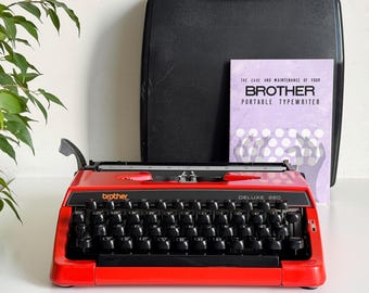 Typewriter Brother Deluxe 220 - Portable, working, Professionally maintained, 1970s, red
