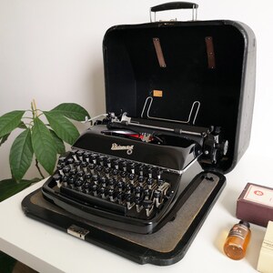 60% OFF! Rheinmetall KST Typewriter, original black color in awesome condition. from the 1950s. Collectable. Unusual gift.