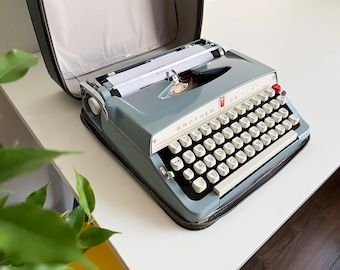 Typewriter Brother Deluxe - 1960, working, professionally maintained, blue