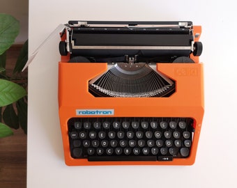 70 % RABATT! Robotron Cella, eine tragbare, funktionierende Vintage-Schreibmaschine aus den 1980er Jahren, in neuwertigem Zustand, mit Koffer, ungewöhnliches Geschenk