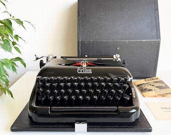 ABCポータブル - 実用タイプライター、1960年、ケース付き - Etsy 日本