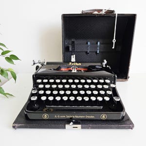 50% OFF!* Black Erika Model 5 a portable working vintage typewriter from the 1930s. Awesome condition. Unusual gift, retro