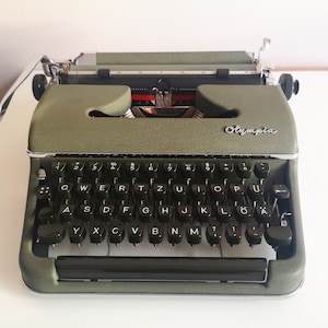 60% OFF! Olympia SM2 Typewriter, original Olive-green color in awesome condition, from the early 1950s. Unusual gift