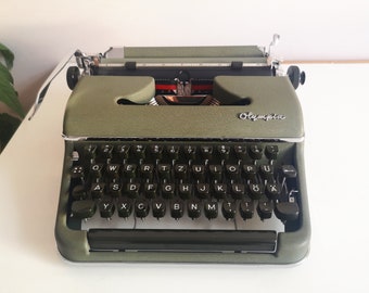 60% OFF! Olympia SM2 Typewriter, original Olive-green color in awesome condition, from the early 1950s. Unusual gift