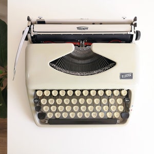 70% OFF! Triumph Adler Tippa, portable vintage typewriter from the 1960s,  unique gift