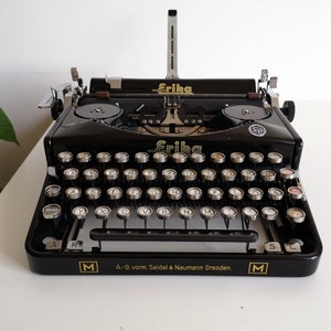 70% OFF!! *Not working! Rare, vintage typewriter Erika Model M, from the 1930s,  collectible. Unusual gift. For decoration