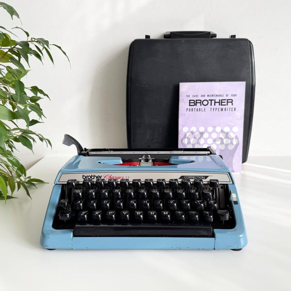 Typewriter Brother Charger 11 - QWERTY - Portable, working, Professionally maintained, 1970s, Light blue