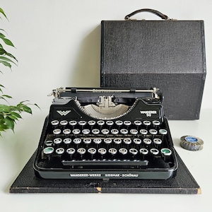 50% OFF!! Rare vintage Continental Wanderer 50 Portable typewriter from the 1930s, collectible. Excellent working condition. Unusual gift.