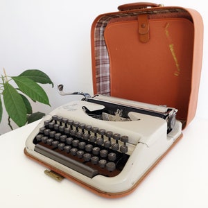 60% OFF!* Genuine Iconic Rare Princess 100 a portable working vintage typewriter from from the 1960’s, with case and manual, unusual gift