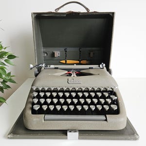 50% OFF!* Erika Model 10 a portable working vintage typewriter from the 1950s. In awesome condition, with case, unusual gift, retro office