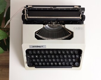 70% OFF! Privileg 165 Cella, a portable working vintage typewriter from the 1980s, with case, unusual gift