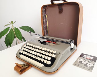 60% OFF!* Genuine Iconic Rare Princess 100 a portable working vintage typewriter from from the 1960’s, with case and manual, unusual gift