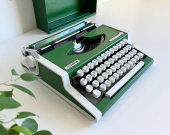 Olympia Traveller de luxe - Máquina de escribir portátil en funcionamiento, década de 1970 - verde, nueva