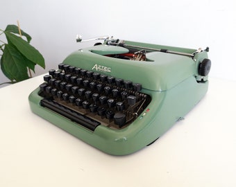 60% OFF!* Green-olive Aztec 500 (Erika 10) portable working vintage typewriter from the 1960s. In Great condition, with case, unusual gift