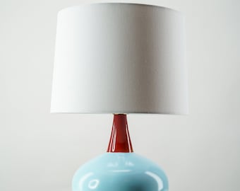 Baby blue ceramic sphere table lamp w/ white fabric shade, Art Deco & Contemporary Style, Outlet and USB port included for easy charging