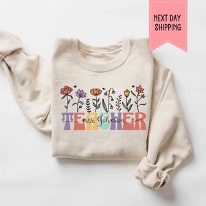 Sweatshirt met aangepaste lerarennaam: bloemdessin, waarderingscadeau