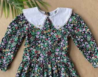 Vintage 1990s long-sleeve floral dress, with collar and button-up back, with cinched waist and a cute lace trim, approximately size 3T