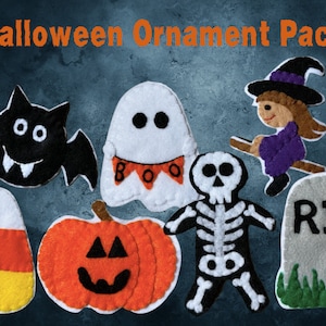May include: A set of felt Halloween ornaments, including a ghost with a "BOO" banner, a bat, a pumpkin, a skeleton, a witch on a broomstick, and a tombstone with "RIP" written on it.