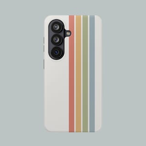 May include: A white phone case with a vertical striped design in muted colors: red, yellow, green, and blue. The phone case has a camera module with three lenses on the left side.