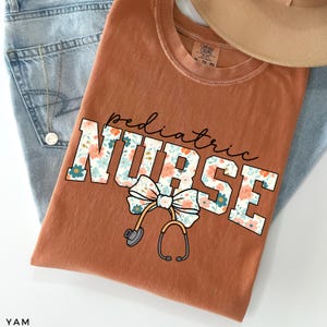 Nurse Comfort Colors® Floral Shirt, Bow Nurse Shirt, RN Shirt, Nurse Graduation Gift, Nurse Week Shirt, Nurse Appreciation, Gift For Nurse