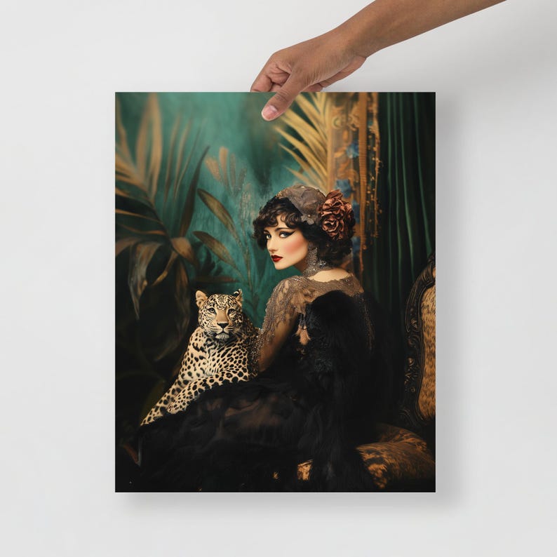 May include: A woman in a black dress and a red flower in her hair sits with a leopard in a lush green and gold setting.