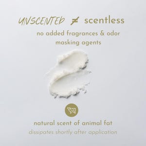 May include: A smear of white, creamy substance centered on a light background. Text reads: UNSCENTED &ne; scentless, no added fragrances & odor masking agents, natural scent of animal fat dissipates shortly after application, with a cow icon.