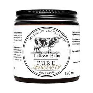 May include: A 120 ml jar of Beyond Functional Food Tallow Balm with a black screw-top lid. The white label features a black and white illustration of a cow, the text Tallow Balm, Pure Unscented, and Grass-Fed, along with additional printed text.